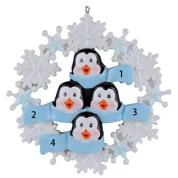 

Penguin family of 4 resin hang Christmas ornaments with glossy snowflake as craft souvenirs for personalized gifts or home decor