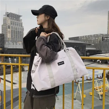 

Sports bag short distance travel bag female handbag large capacity travel portable luggage bag boarding fitness bag male