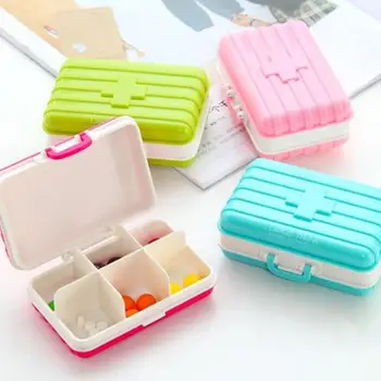 

Mini Travel Suitcase Plastic 6 Grids Medicine Pill Box Jewelry Storage Case broken resistant. Creative suitcase shape design.