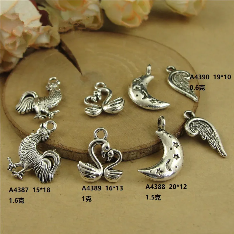 

100Pcs/lot Antique Silver Cock Charms Elegant Swan Charms for Jewelry Making Cute Wing Pendant