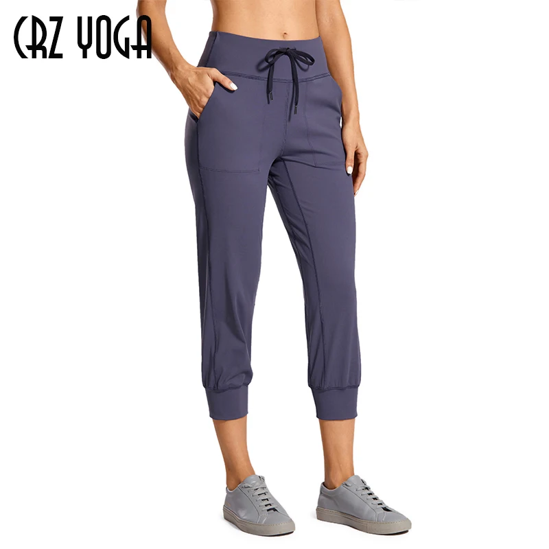 CRZ YOGA Women's Naked Feeling Workout Yoga Jogger with Pockets Drawstring Comfy Lounge Capri Pants CRZ YOGA Women's Naked Feeling Workout Yoga Jogger with Pockets Drawstring Comfy Lounge Capri Pants