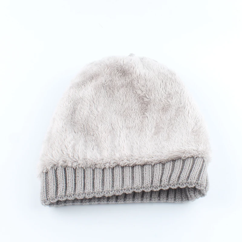 Женская зимняя вязаная шапка для женщин 100% натуральный мех помпон шапка флисовая подкладка шапочки черепа перекрестная вязка шапки