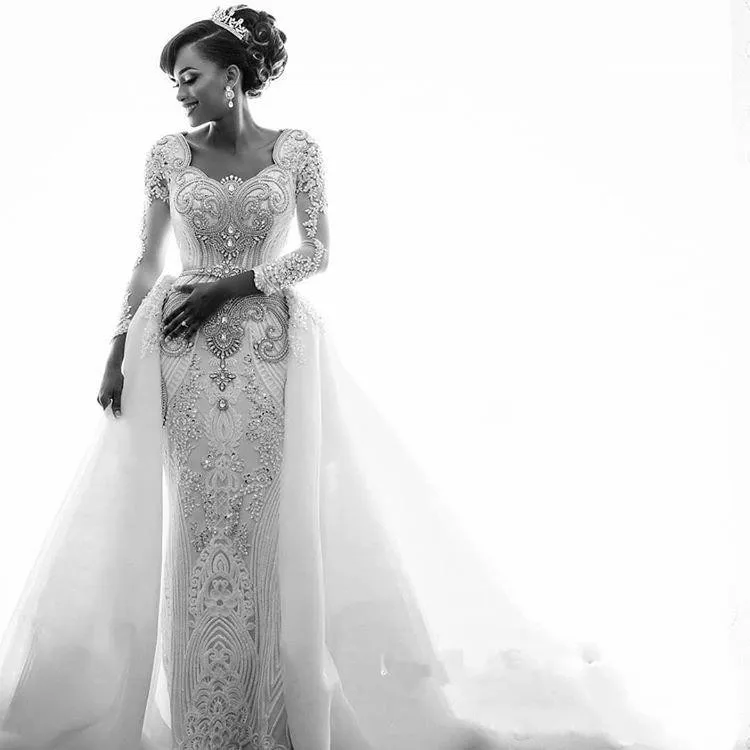 2019 African Long Sleeves Lace Mermaid Wedding Dresses Scoop Neck Lace Applique Beaded Crystals Over Skirts Court Train Wedding Bridal Go
