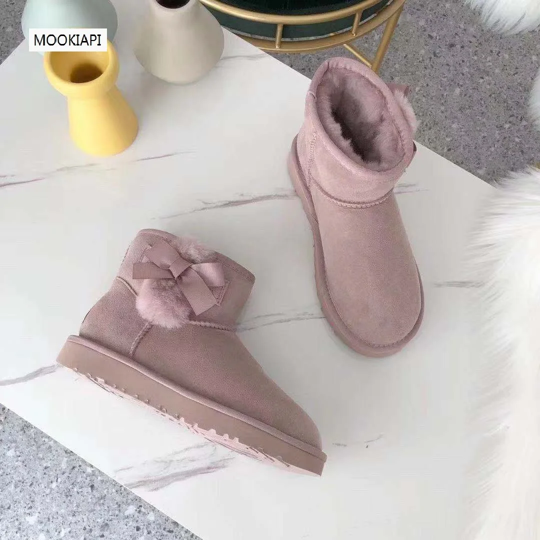 Australia's latest women's snow boots with wool ball, real sheepskin, natural wool, free delivery of high-quality shoes