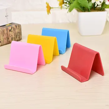 

lazy Universal Mini Portable Mobile Phone Holder Candy Fixed Holder Home Supplies accessories decoration phone dropshipping