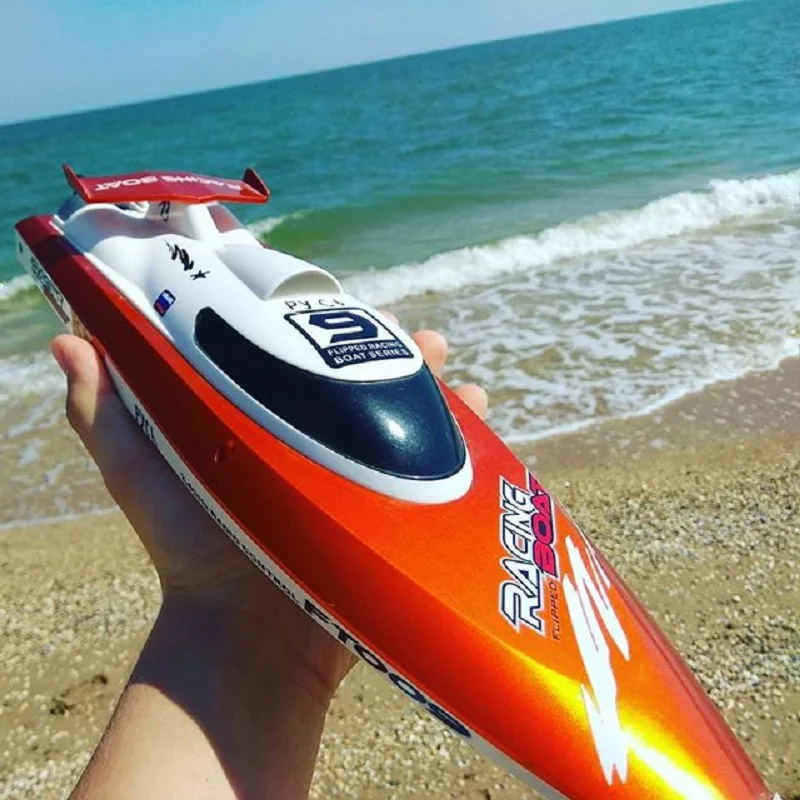 

Boy RC Racing Boat FT009 2.4GHz Remote Control Electric Speedboat4 Channel Metal Water Cooling High Speed Racing Kids Toys Gift