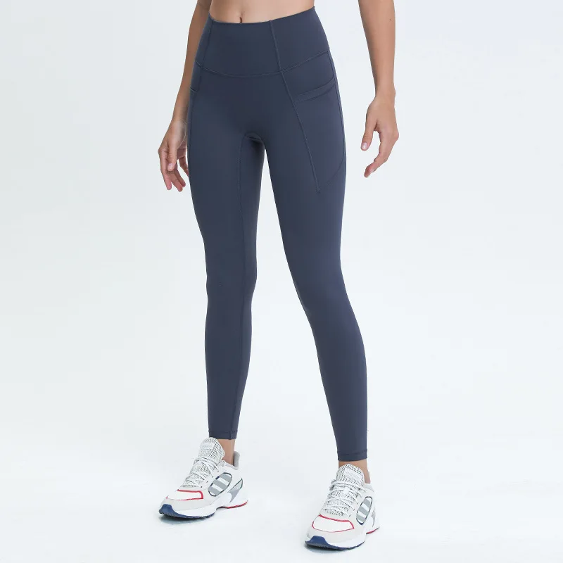 

New Nude Feeling No Embarrassment Line Yoga Pants with Pockets on Both Sides of The Fitness Running Sports Nine-point Leggings