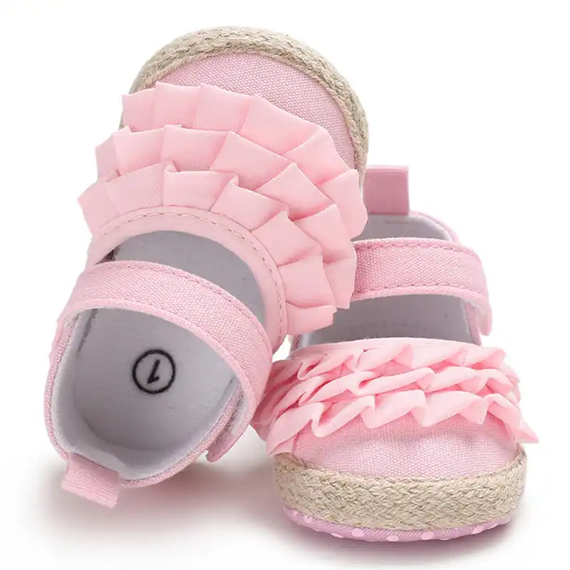 pink and blue baby shoes