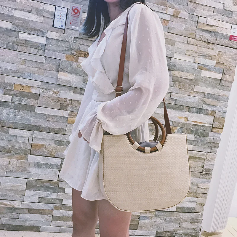

Bag female 2019 beach bag ring wooden handle woven handbag straw beach shoulder bag female street shopping bag commuter bag