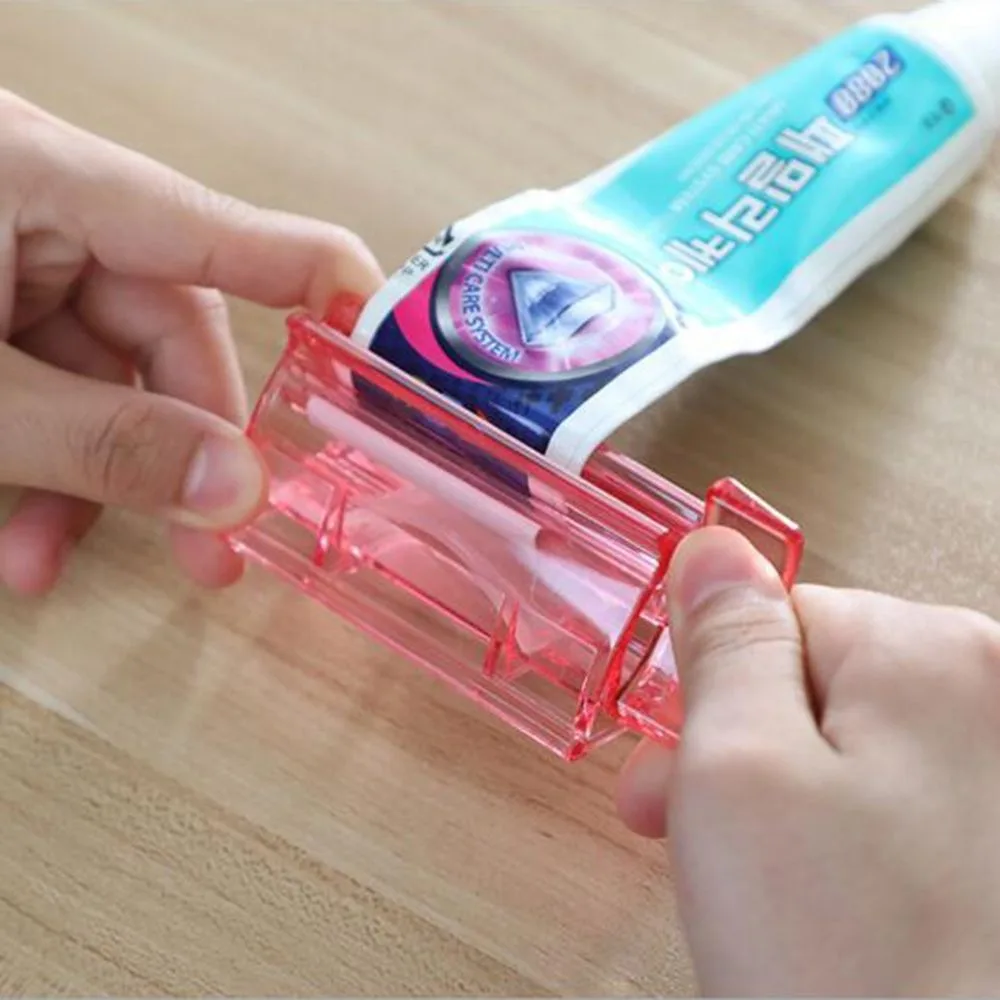 hot New Rolling Tube Tooth Paste Squeezer Dispenser Toothpaste Dispenser Holder Bathroom Stand