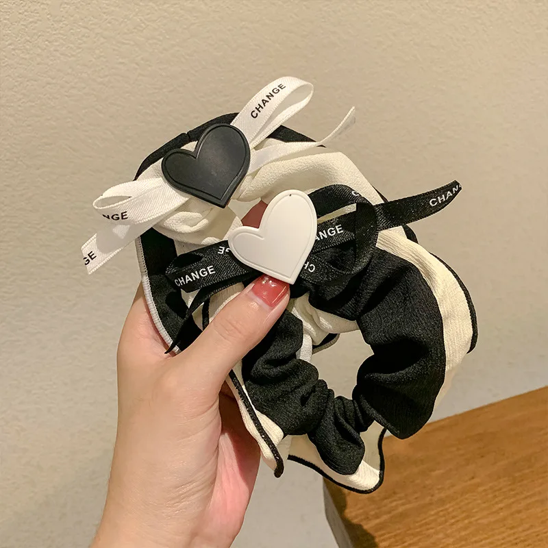 

black white contrast color heart-shaped bow hair rope ruffled large intestine ring ball head rubber band hair ring head rope