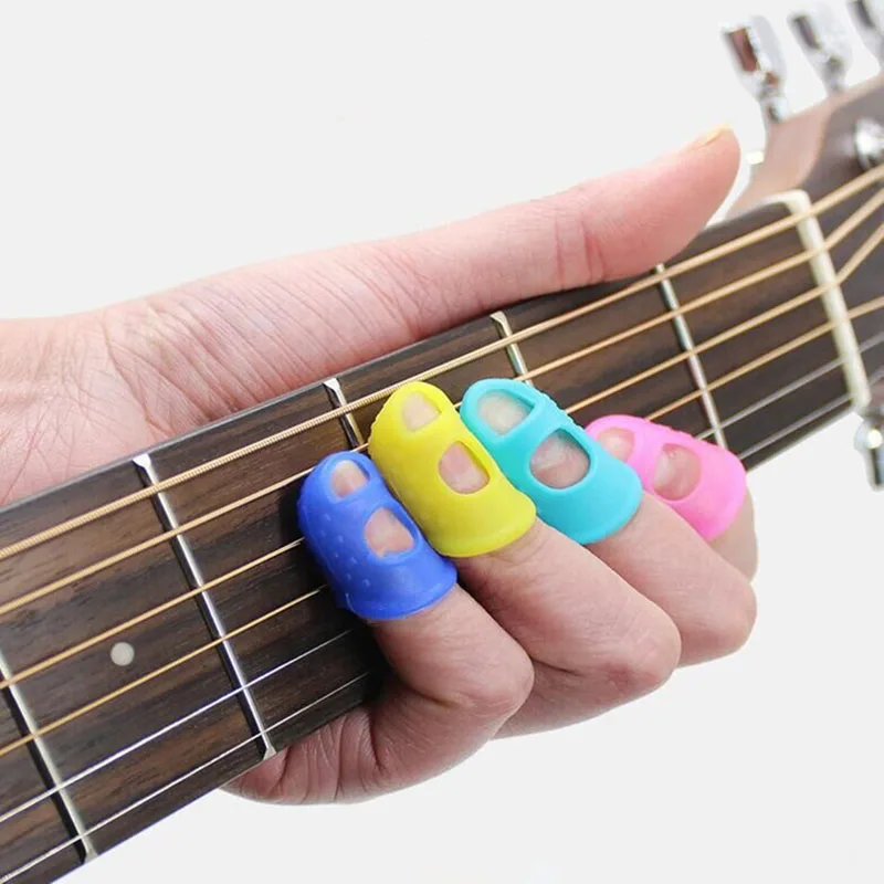 

4pcs Guitar Fingertip Protector 2019 New Fingerstall Silicone Guitar String Finger Guard Accessories For Ukulele Guitar