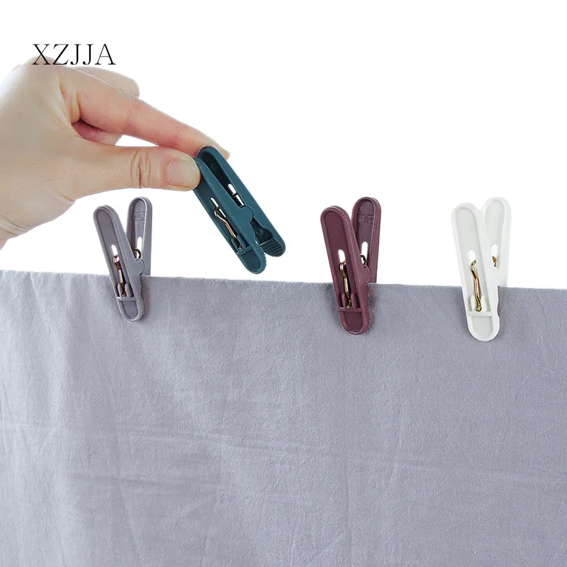 XZJJA 24 шт./компл. цветные пластиковые прищепки для одежды висячие штифты прищепки для пляжного полотенца ветрозащитные кровати прищепки