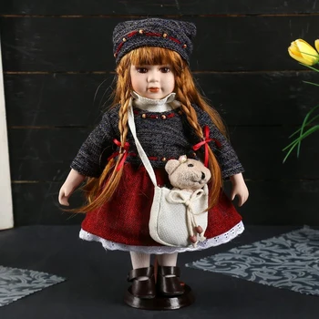 

Doll collection ceramics "Nastenka in a sweater and knitted hat with a handbag" 30 cm 4520514