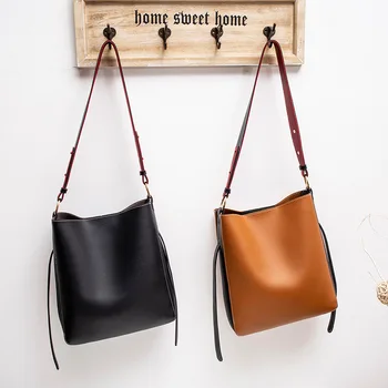 

The New Korean Version Of The Hong Kong Style Retro Bucket Bag Wild Wide Shoulder Strap Shoulder Messenger Bag