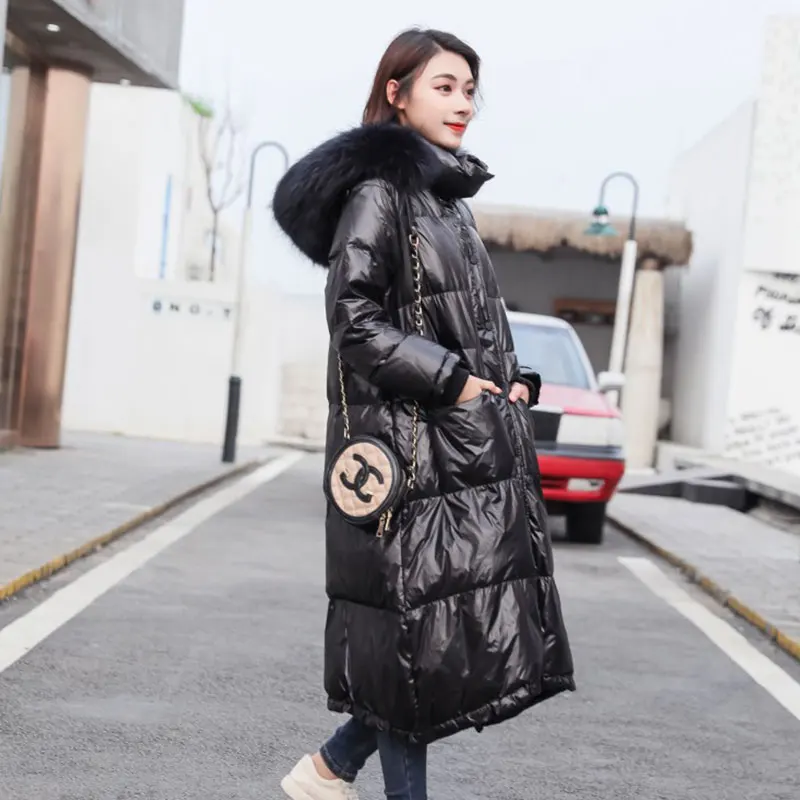 Черные пуховики, женские парки с капюшоном, зимнее пальто, Длинная женская теплая верхняя одежда, плотные свободные куртки с воротником из меха енота, топы HS746