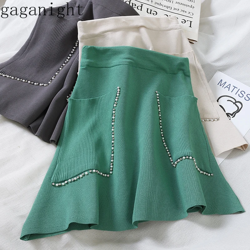 

Gagarich Spring Autumn Knitted Beading Mini Skirts Women Solid Short Skirts Girls Big Pocket Bodycon Elastic High Waist A Line