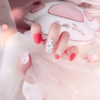 

New cute honey peach cartoon pattern fake nails Japanese Bride matte pure color false nails lady full nail tips middle-long
