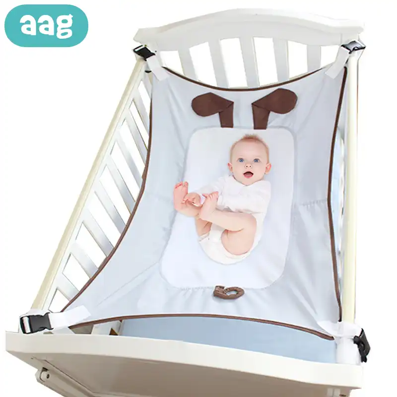 infant sleeping in bouncer