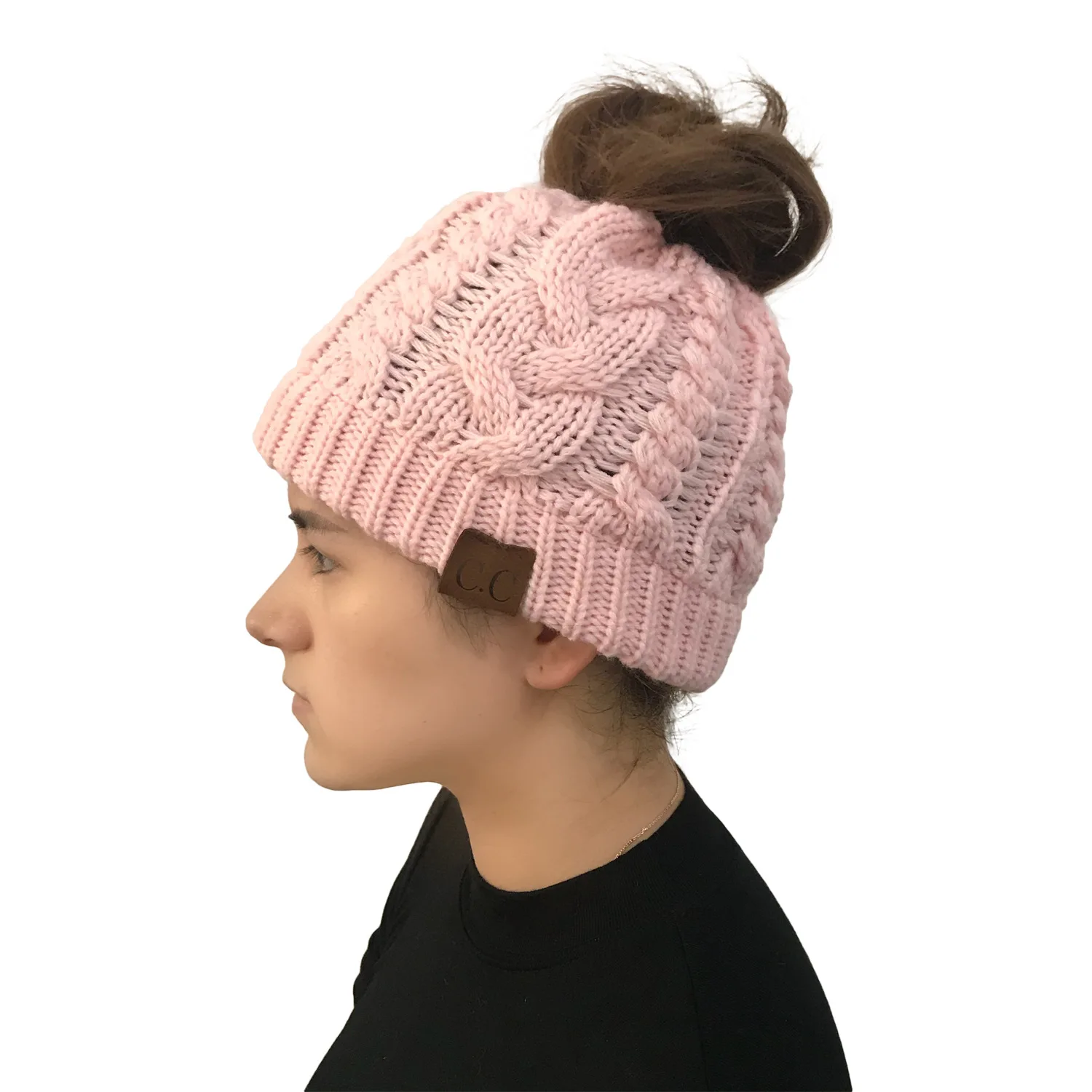 European and American autumn and winter hats pop-up twist knitted ponytail hat lady's woolen hat