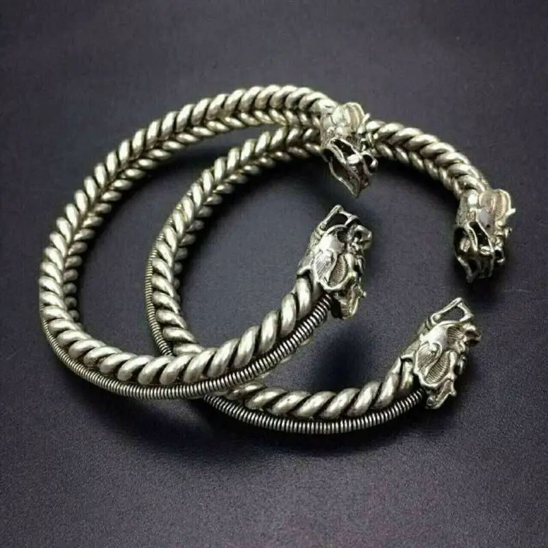 

Китайский старинный тибетский серебряный браслет с головой дракона