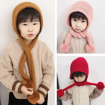 

New autumn and winter children's warm baby hat boys earmuffs knit hat girls conjoined cap baby double ball wool cap kids beanies