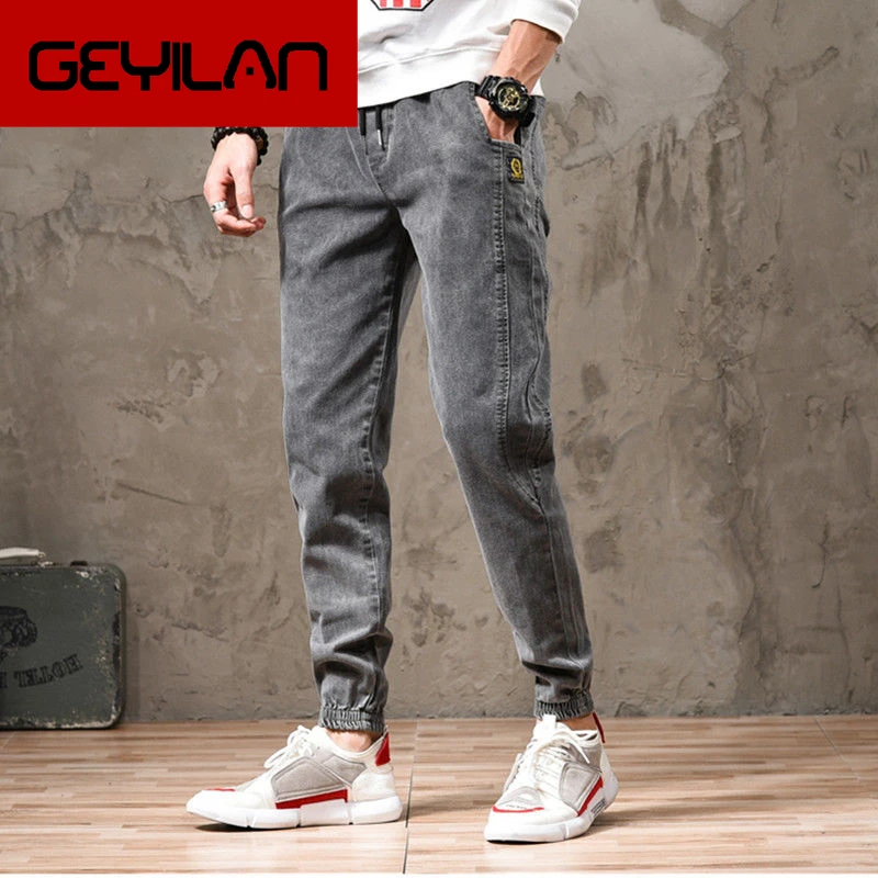 

Elastic jeans men's spring and summer casual leggings Korean version of the trend Harlan cowboy overalls
