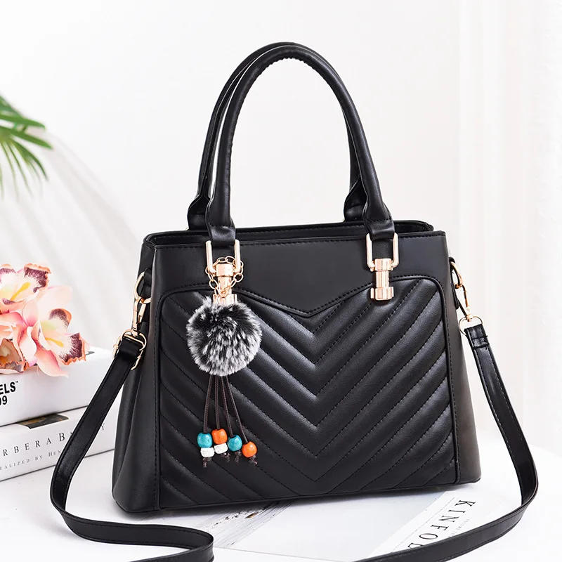 

[10 from the Grant] Car Suture Triangular Embossing Versatile WOMEN'S Bag Bag Textured Fuzzy Ball Pendant Hand Mommy Bag