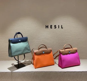 

New high quality leather fashion trend individual and simple large capacity cowhide combined Canvas Handbag for women