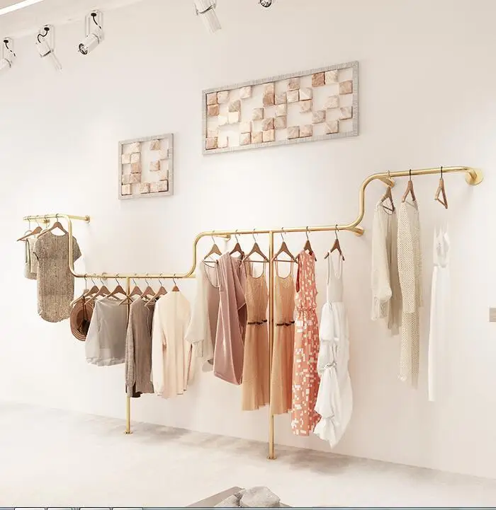 

A shelf on which clothes are sold in a women's clothing store