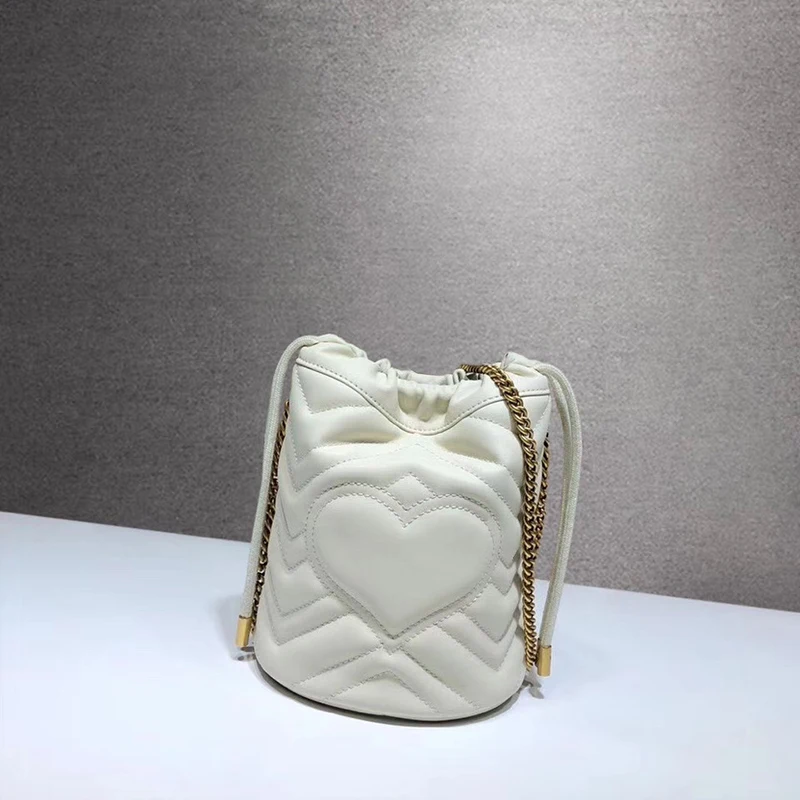 

2019 new heart-shaped Mini bucket bag Single Shoulder Messenger Bag wave pattern drawstring love bag lady
