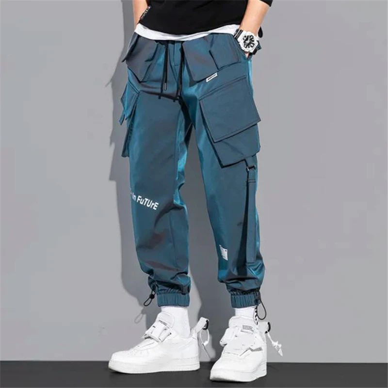 Hip Hop Streetwear Joggers Pants Men Student Casual Cargo Pant Trousers High Street Elastic Waist Loose Laser Harem Pant Boys cargos for men