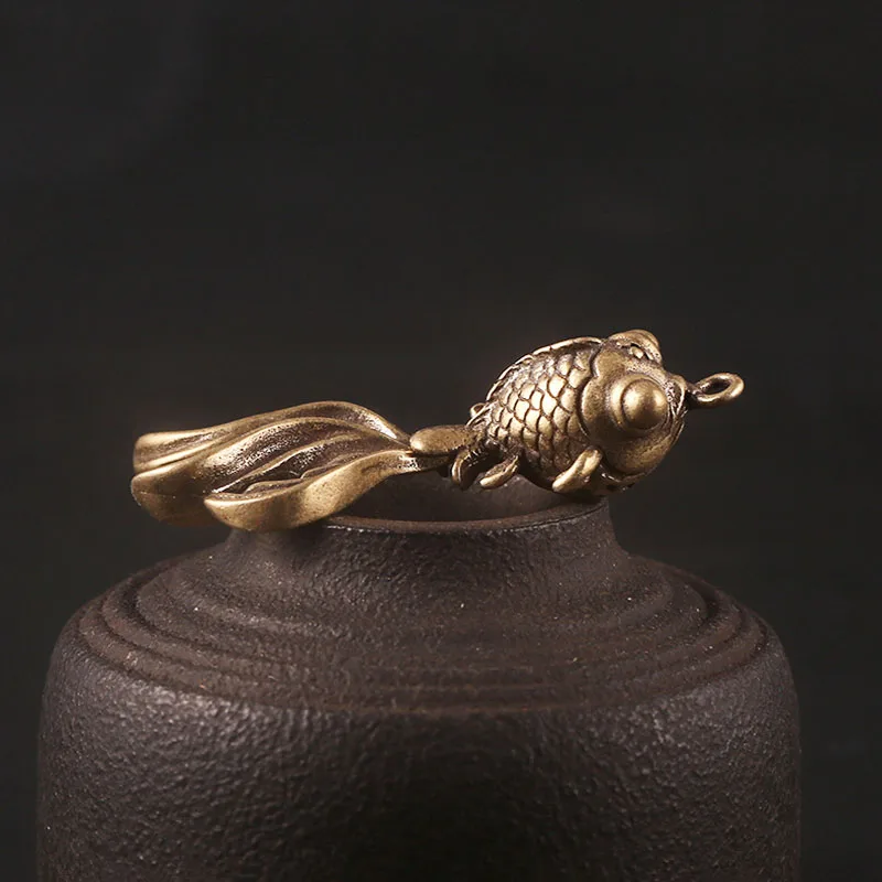 goldfish brass pendants (7)