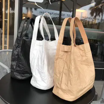 

2018 Vintage Kraft Paper Bucket Bag Waterproof Personality Travel Tote Bag Waterproof Causal Big Capacity Shoulder Messenger Bag