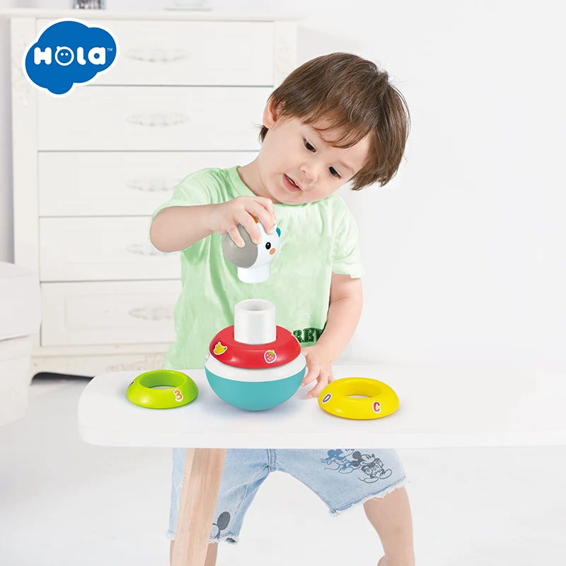 HOLA TOYS Baby Rattles Mobile Doll Bell Blink Eyes Tumbler Roly poly Silicon Teether Toy Fun 5