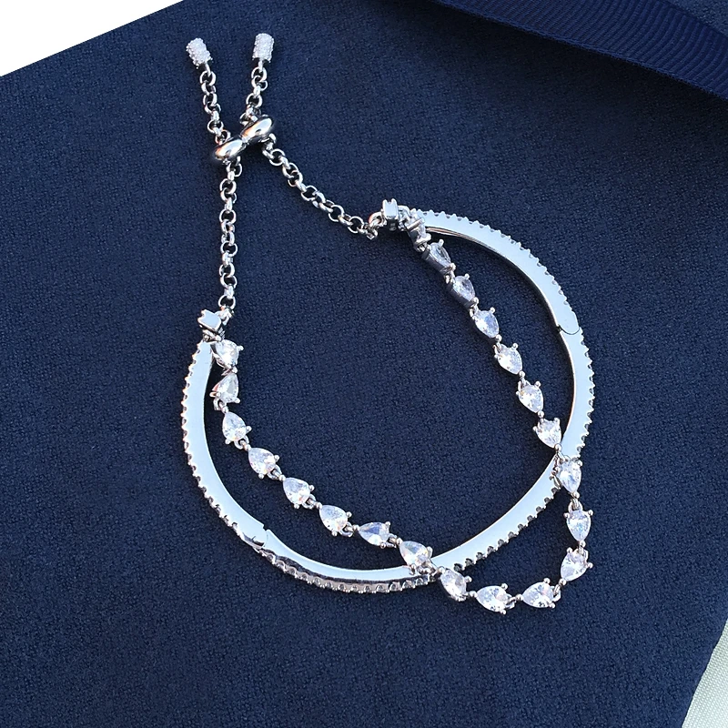 Элегантный двухслойный браслет серебряного цвета с микро инкрустацией