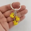 Cute Little Yellow Acrylic plastic DUCK Key Chain Dancing Duck Keychain Couples Women Friend Gift Bag Pendant Accessory Keyring ► Photo 1/3
