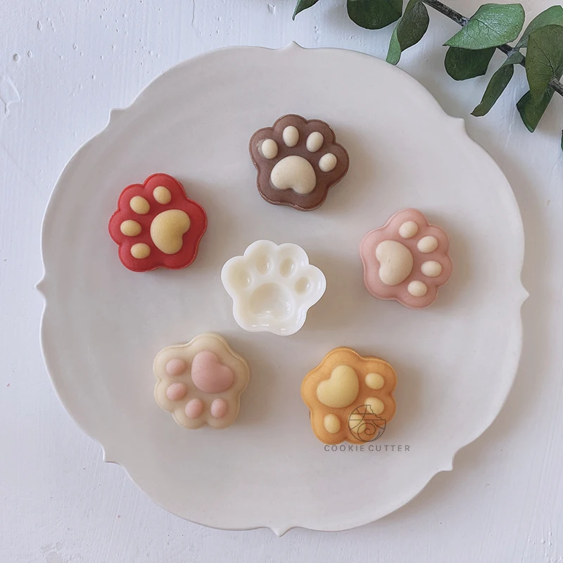 https://ae01.alicdn.com/kf/H8ec413eb29d64e9abc07c8127785e575C/20g-Mini-Cat-Paw-Shape-Mold-Mooncake-Mold-Hand-Press-Mold-Plungers-Pastry-Dessert-Cake-Decoration.jpg