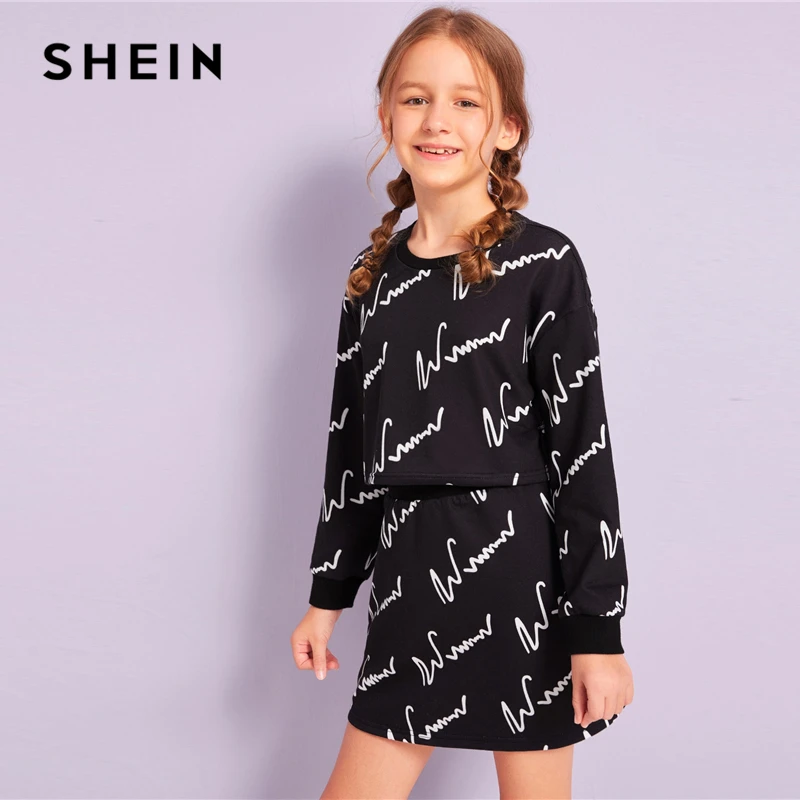 Najtaniej SHEIN Kiddie Girls czarna graficzna bluza z nadrukiem i spódnica zestawy dwuczęściowe zestawy dla dzieci 2019 jesień z długim rękawem strój codzienny