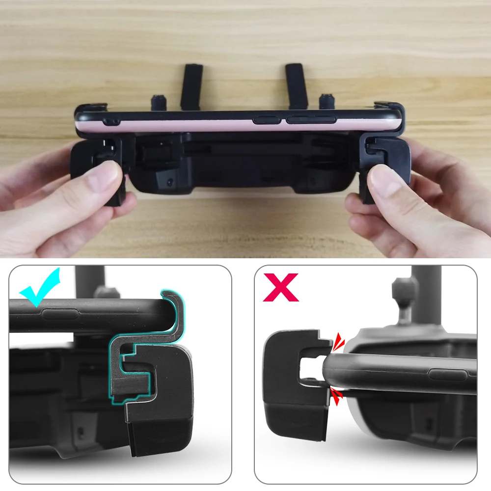 Lot de 2 supports téléphone pour radiocommande drone DJI Mavic, posés sur une surface