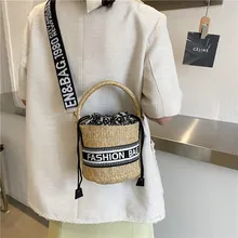 

2022 Spring Korean Style Drawstring Bag Wide-shoulder Woven Straw Bucket Letter Round Handbag Shoulder Diagonal