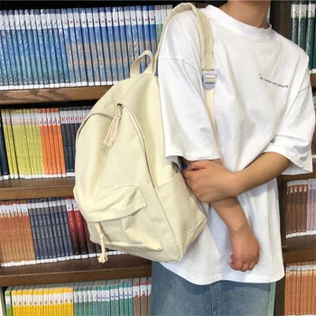 

Korean version of casual simple canvas travel backpack men and women college students campus backpack vintage girl school bag