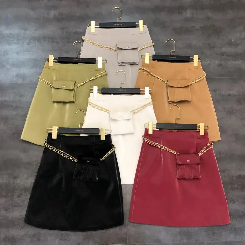 

2019 New Metal Chain Cell Phone Bag Decorated Bright Face Pu Leather Skirt Woman Solid Color High Waist Short Skirts