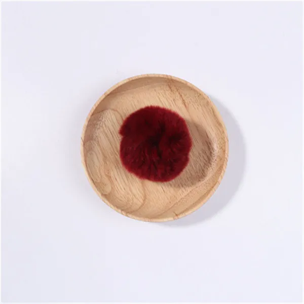 Red wine 6 см conejo Rex pompones bolas de piel para coser en sombreros punto llavero bufanda zapatos piel Pom DIY manualidades Accesorio - Цвет: Red wine