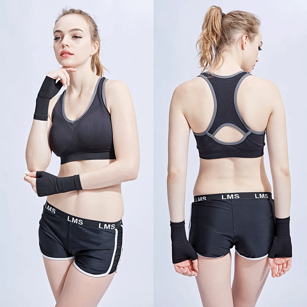 The wrist and thumb compression sleeve pair shown in Black and Beige on both wrists demonstrating the 70% Lycra 30% nylon construction that delivers consistent compression for wrist sprains, carpal tunnel, tendinitis, and sport protection during golf, tennis, volleyball, badminton, and weightlifting.