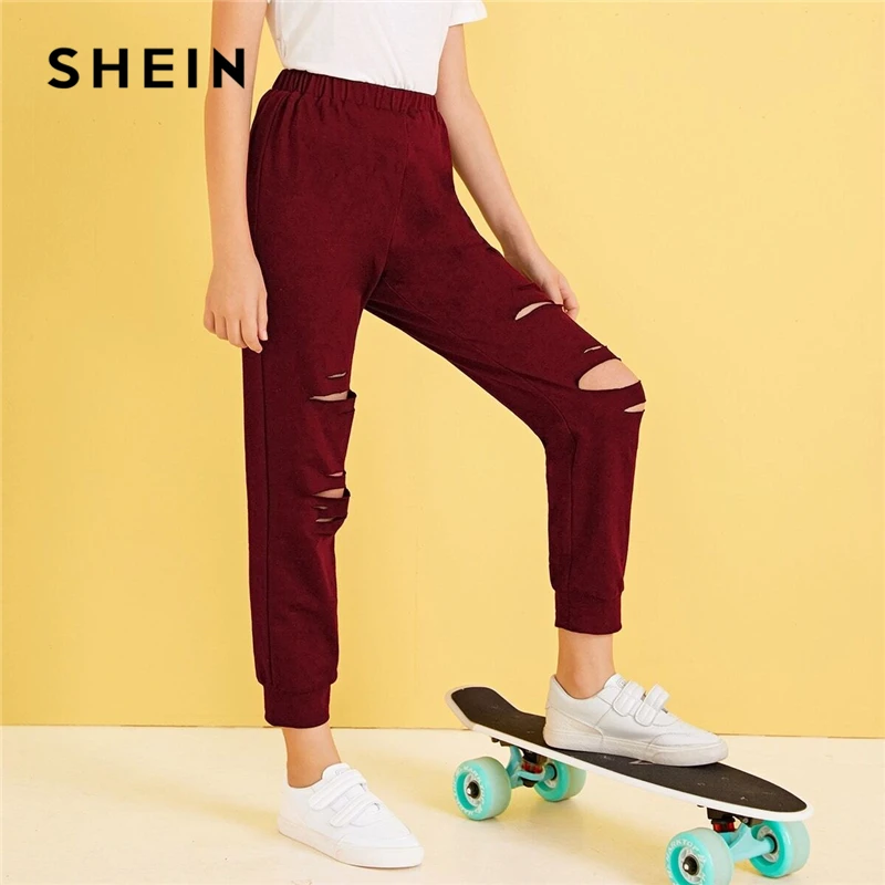 SHEIN для малышей однотонные рваные укороченные Повседневное спортивные штаны детские штаны Осенняя уличная одежда с эластичной резинкой на талии брюки для девочек-подростков
