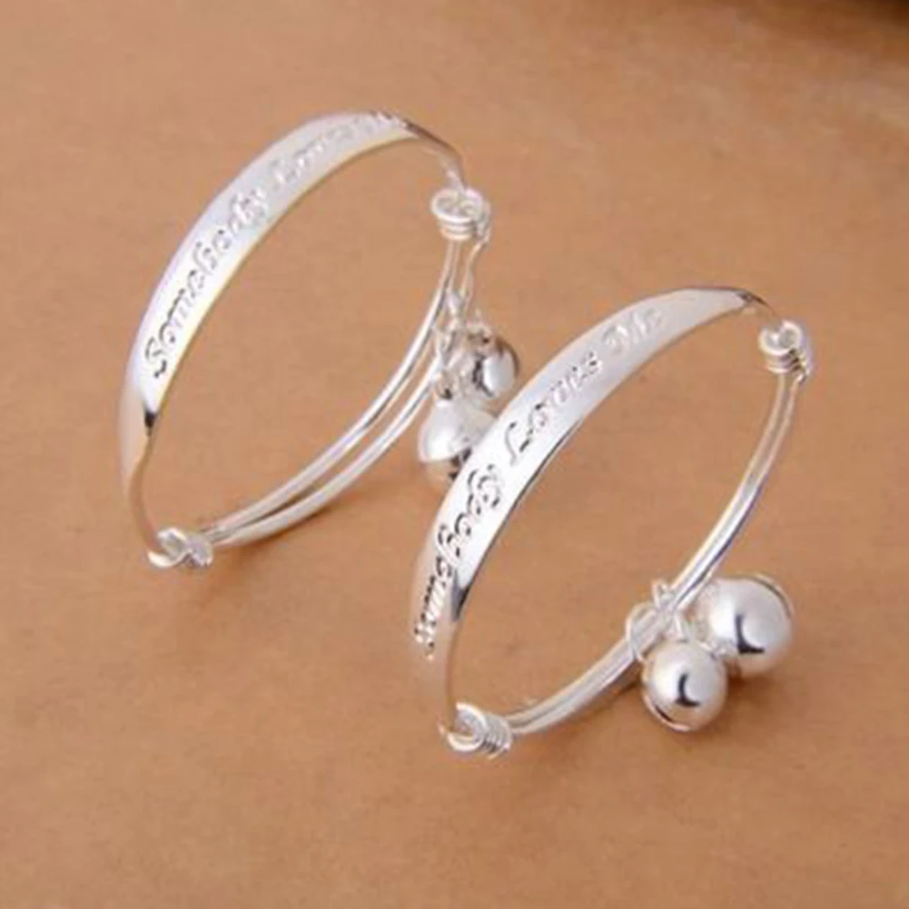 

2Pcs Cute Silver Plated Baby Bracelet Alphabet Printed Small Bell Design Bracelet Baby Bangle
