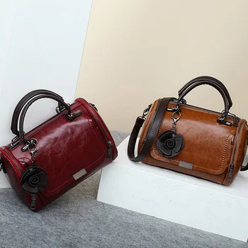 

Women Fashion Boston Tote Pompom luxury famous brand designer vintage European retro crossbody pure and handbag messenger bolsa