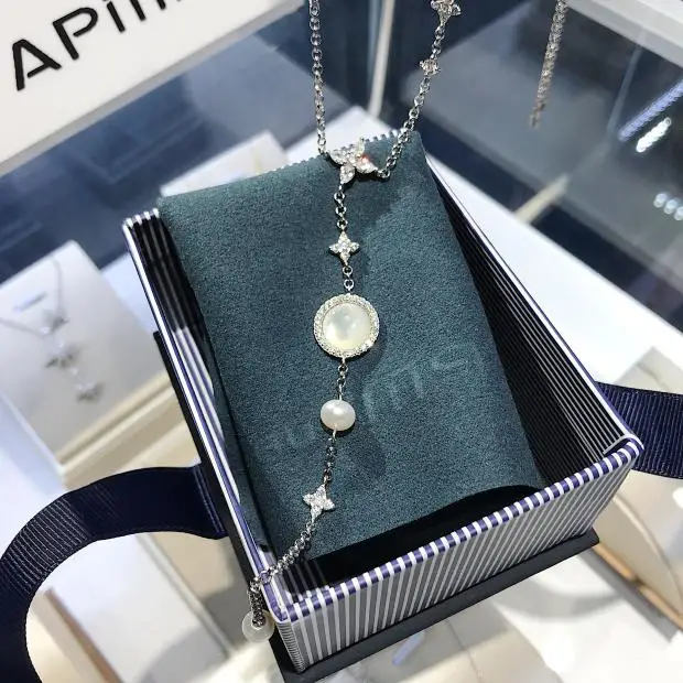 

Fresh water pearl long shell necklace temperament female clavicle chain adjustable sweater chain