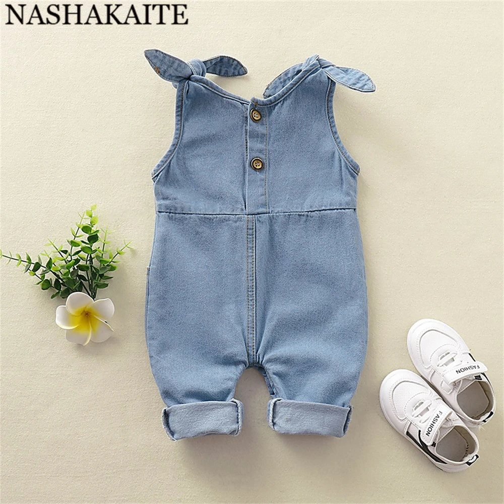 NASHAKAITE Baby Girl Clothes Shoulder Bandage Jeans Baby Overalls Pocket Deco Cute Baby Girl Denim Overalls Newborn Jumpsuit Baby Bodysuits made from viscose 